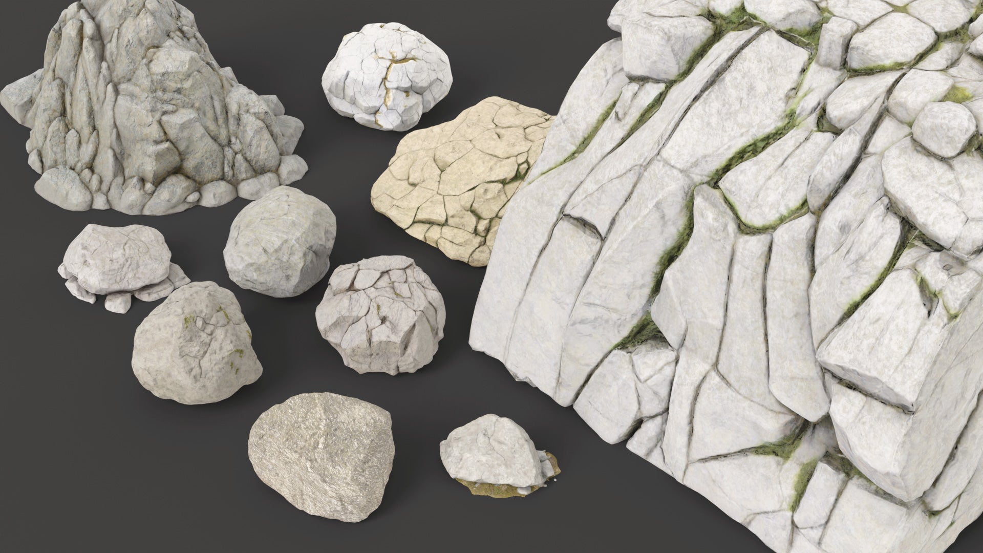 3D model of 10 mountain rocks and boulders, extremely realistic, lowpoly, shaded with PBR materials, these rocks are game ready. (FBX, GLB, and Blender files)