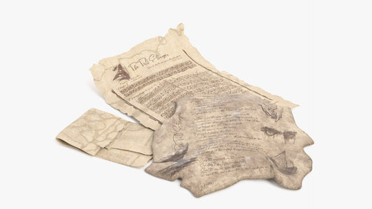 a 3D model of three medieval fantasy parchments, two of them are made of paper (one flat and the other folded),  and the other made of worked leather. The parchments have the lyrics of the song along sketches of the sides, and the chords for a fantasy instrument