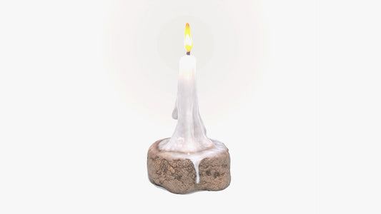 3d model of a melted candle dripping atop a cork stand. The model has low polycount, PBR textures and is the perfect game asset for any project