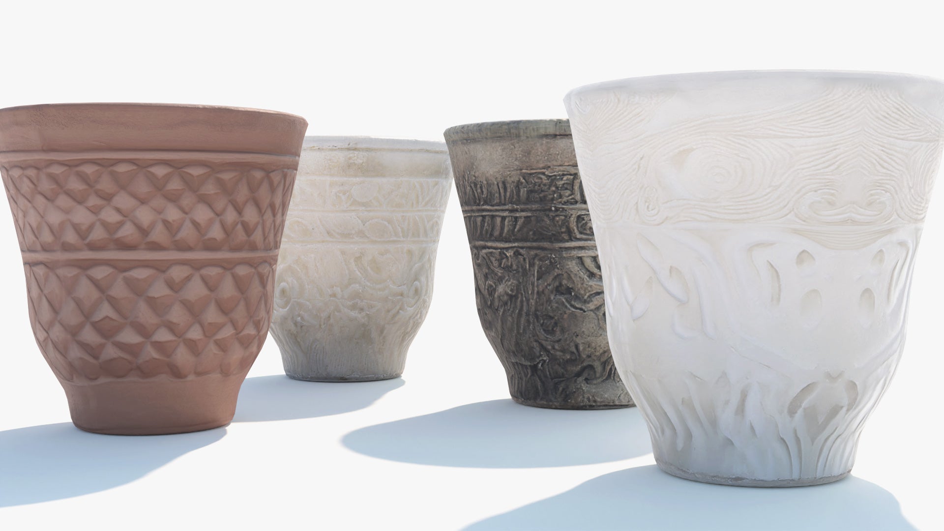 3D model of four ornamental rustic cups made of clay, ceramic, marble, and carved bone. Lowpoly and PBR textures make them game ready and perfect for the metaverse