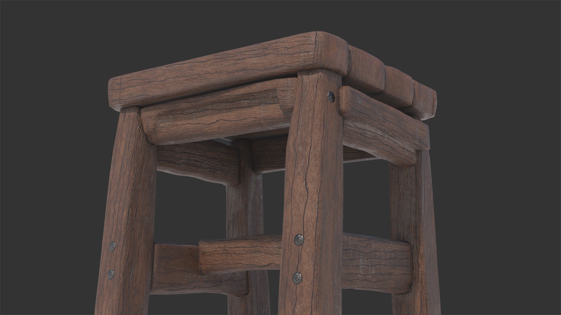 3D model of a rustic wooden stool, short and rough, looks handmade and it would fit well in a medieval setting. It had low polycount and still looks very realistic!