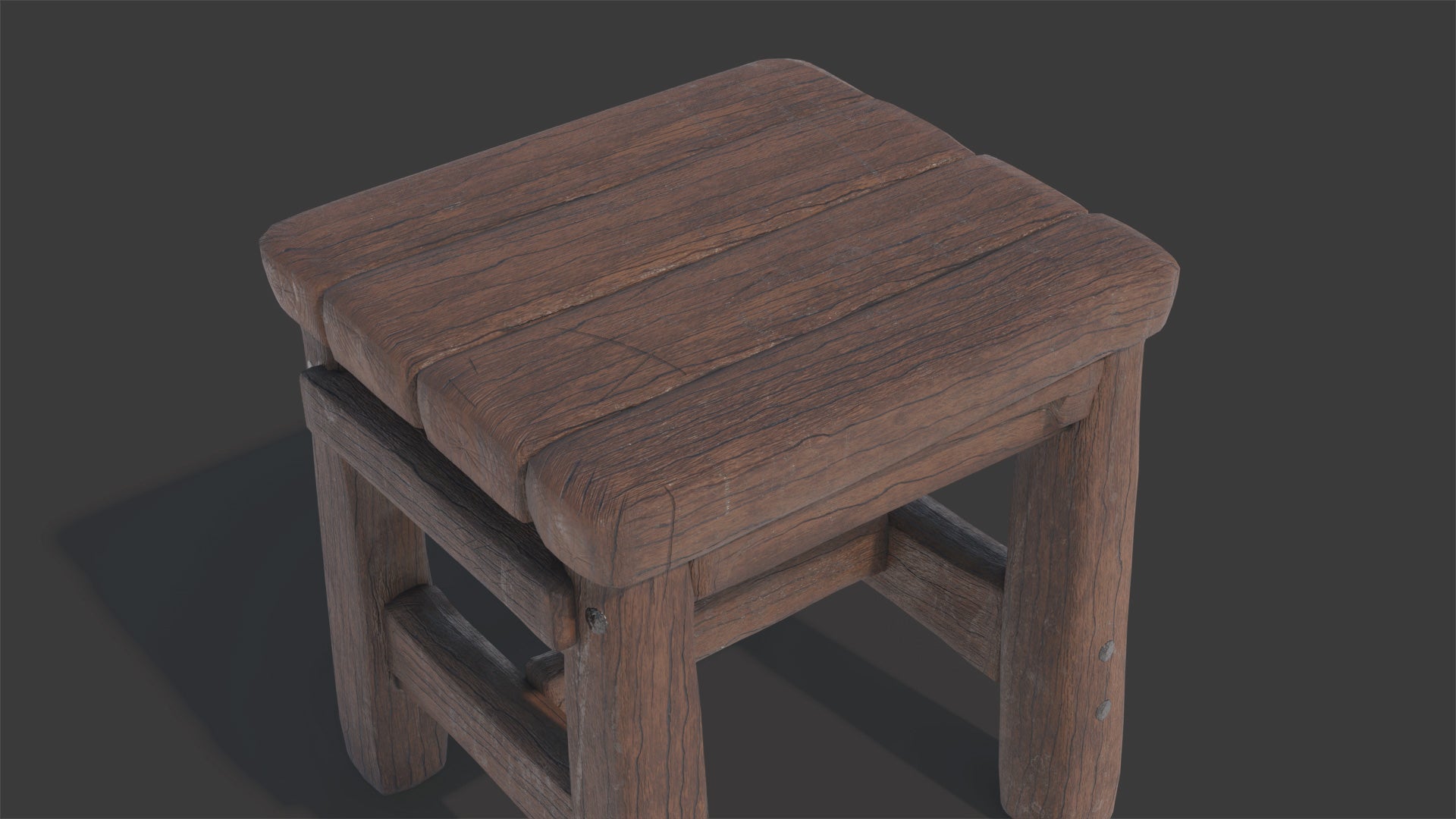 3D model of a rustic wooden stool, seen from the top, looks handmade and it would fit well in a medieval setting. It had low polycount and still looks very realistic!