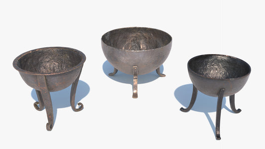 Three metallic medieval braziers with feet on a white background. Game ready 3D model with low poly count and PBR materials