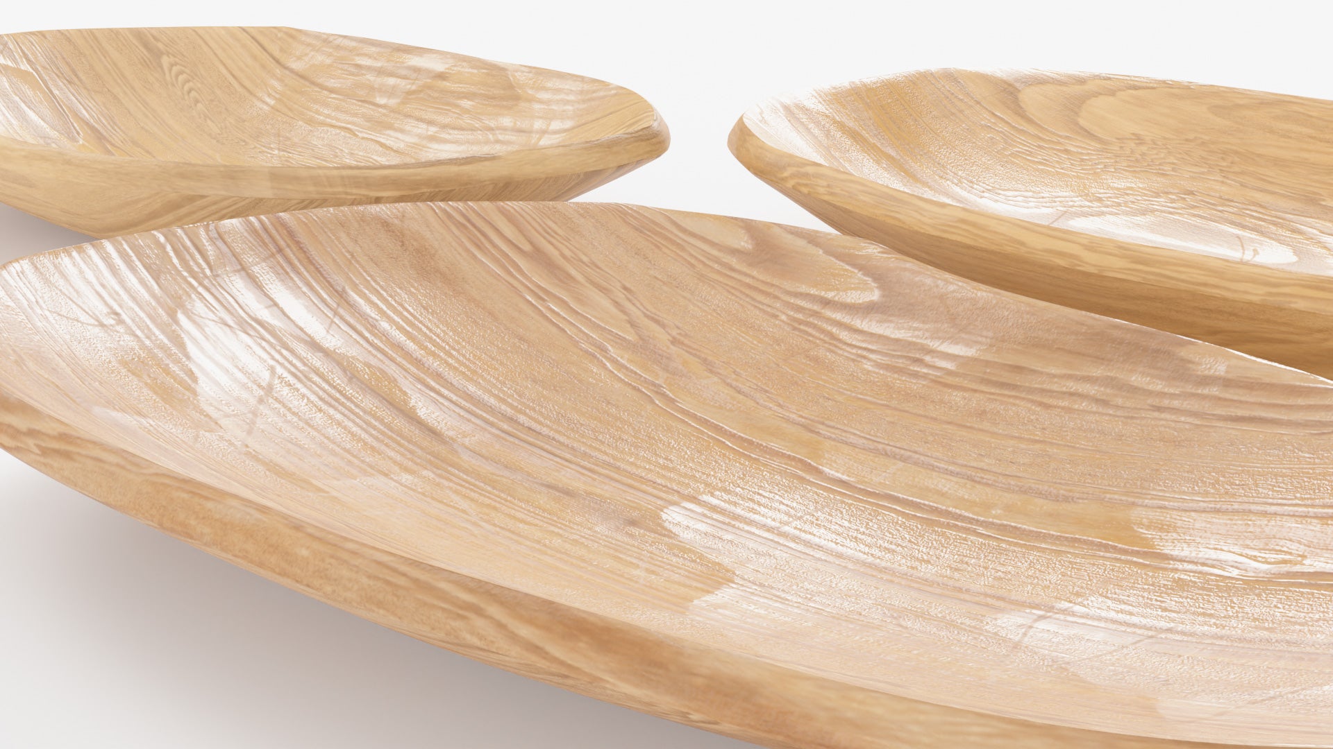 Closeup of a 3D model of three asymmetrical plates that seem to be hand-carved, stacked on top of another. The models have low polycount, and PBR materials, so they look very realistic